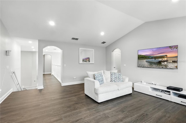 13924 Jomatt Loop, Winter Garden, FL 34787 - living room featuring arched walkways, wood finished floors, lofted ceiling, and recessed lighting