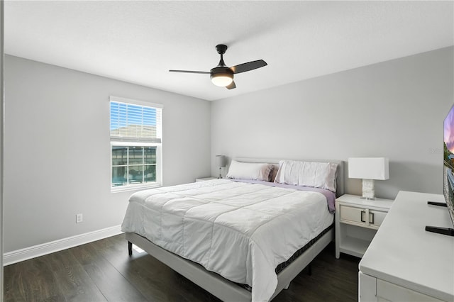 13924 Jomatt Loop, Winter Garden, FL 34787 - bedroom with dark wood-style floors and a ceiling fan