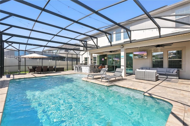 13924 Jomatt Loop, Winter Garden, FL 34787 - view of pool featuring an outdoor living space, a ceiling fan, a patio area, and a lanai