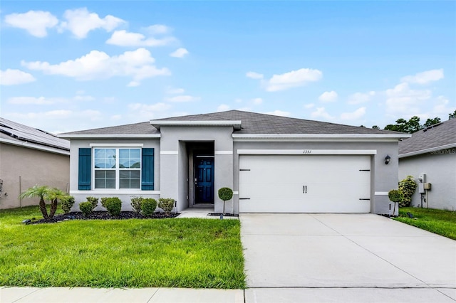 1351 Fox Squirrel Dr, Davenport, FL 33897 - ranch-style home with a garage, a front yard, driveway, stucco siding, and roof with shingles