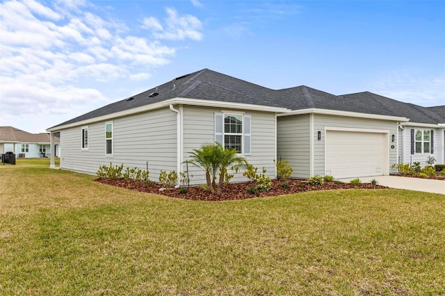 85 Las Casitas Blvd, Palm Coast, FL 32137 - view of property exterior featuring an attached garage, driveway, a lawn, and roof with shingles