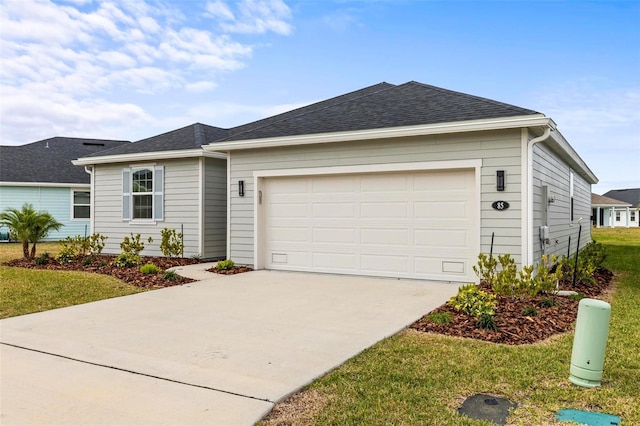 85 Las Casitas Blvd, Palm Coast, FL 32137 - single story home with driveway, a garage, a shingled roof, and a front lawn