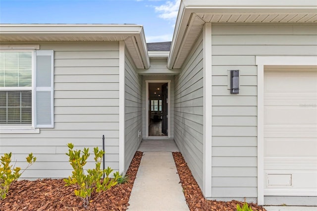 85 Las Casitas Blvd, Palm Coast, FL 32137 - entrance to property with an attached garage