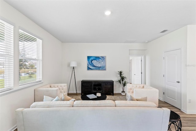 85 Las Casitas Blvd, Palm Coast, FL 32137 - living area featuring light wood finished floors and baseboards