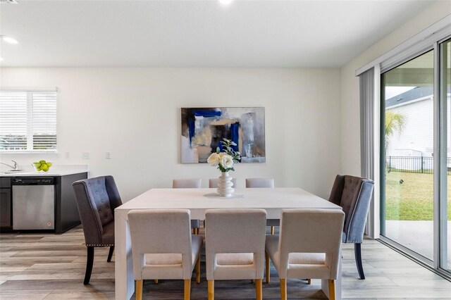 85 Las Casitas Blvd, Palm Coast, FL 32137 - dining room with light wood-style flooring and recessed lighting