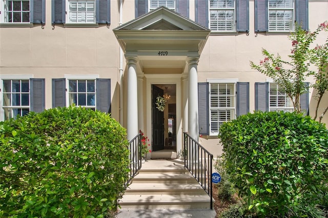 4709 Fox St, Orlando, FL 32814 - doorway to property featuring stucco siding