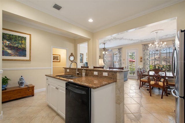 4709 Fox St, Orlando, FL 32814 - kitchen featuring dishwasher, freestanding refrigerator, light tile patterned floors, ornamental molding, and white cabinetry