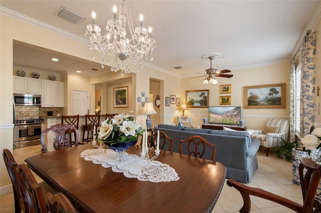 4709 Fox St, Orlando, FL 32814 - dining space featuring light tile patterned floors, crown molding, ceiling fan, and a chandelier