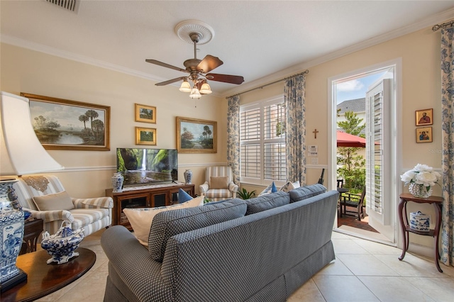 4709 Fox St, Orlando, FL 32814 - living room featuring ornamental molding, light tile patterned flooring, and a ceiling fan