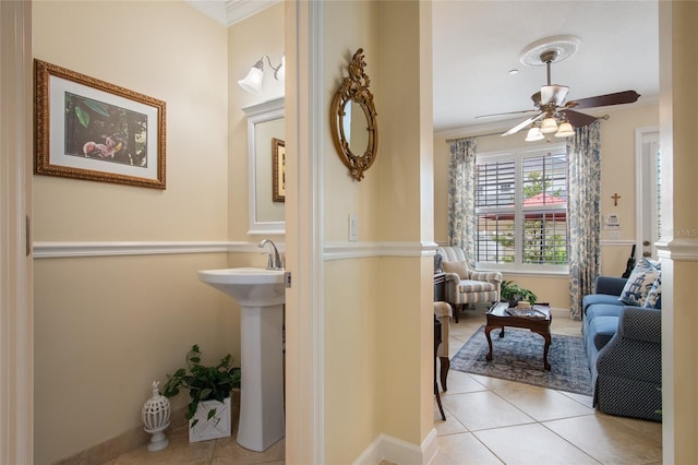 4709 Fox St, Orlando, FL 32814 - bathroom with tile patterned floors, a ceiling fan, and crown molding