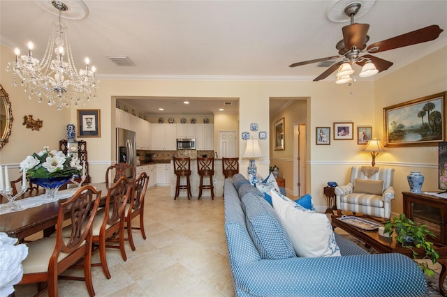 4709 Fox St, Orlando, FL 32814 - living area with crown molding, a chandelier, ceiling fan, and light tile patterned floors
