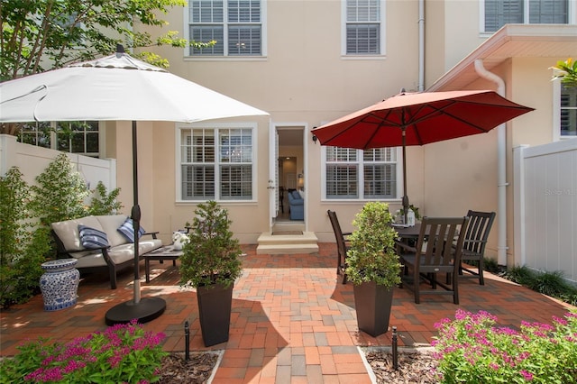 4709 Fox St, Orlando, FL 32814 - view of patio featuring outdoor lounge area