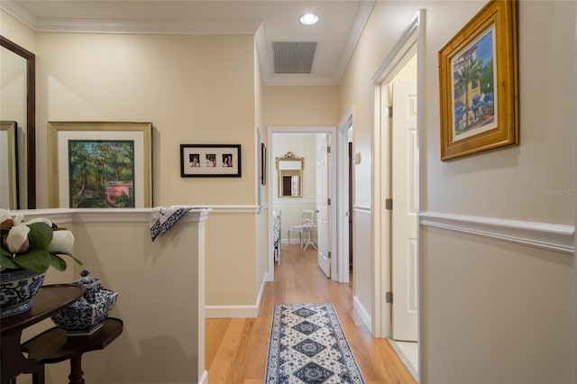 4709 Fox St, Orlando, FL 32814 - hall with light wood-type flooring, crown molding, and recessed lighting