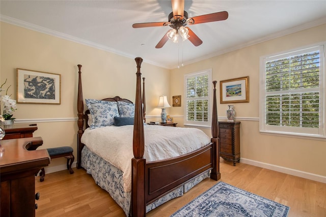 4709 Fox St, Orlando, FL 32814 - bedroom featuring light wood-type flooring, ornamental molding, and a ceiling fan