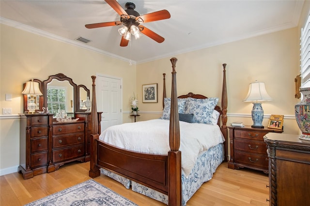 4709 Fox St, Orlando, FL 32814 - bedroom with light wood-style floors, crown molding, and a ceiling fan