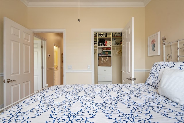 4709 Fox St, Orlando, FL 32814 - bedroom featuring ornamental molding, a closet, and a walk in closet