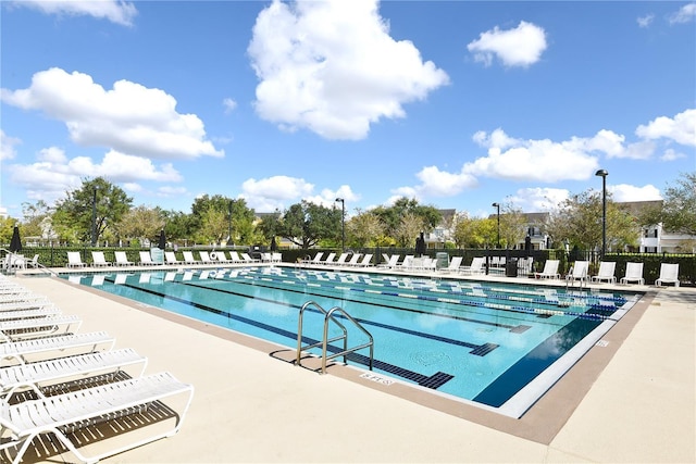 4709 Fox St, Orlando, FL 32814 - community pool featuring a patio