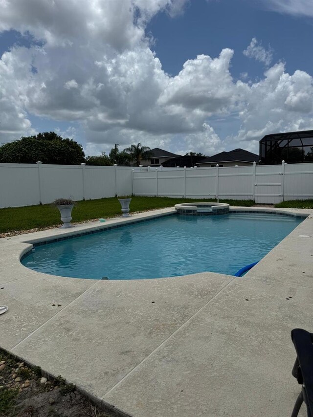 5040 Rock Rose Loop, Sanford, FL 32771 - view of swimming pool with a fenced backyard, a patio, and a pool with connected hot tub