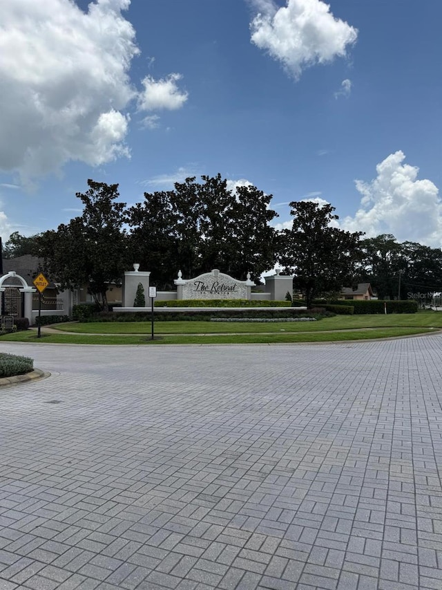 5040 Rock Rose Loop, Sanford, FL 32771 - surrounding community featuring a lawn
