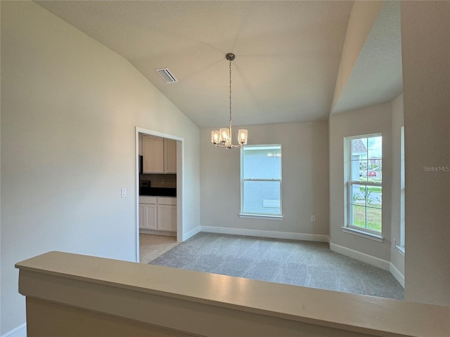 3891 Sagefield Dr, Harmony, FL 34773 - unfurnished room featuring a chandelier, vaulted ceiling, and light carpet