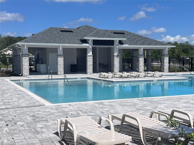 3891 Sagefield Dr, Harmony, FL 34773 - community pool featuring a patio area