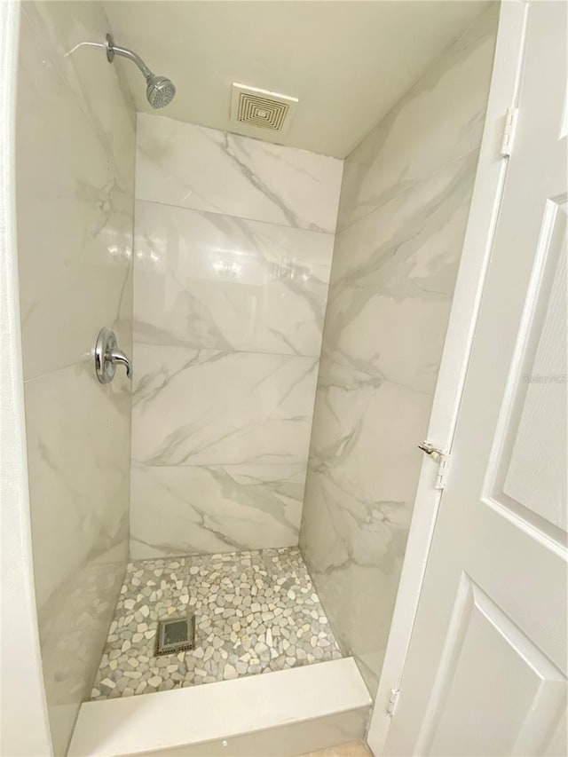 508 Sandtree, Palm Beach Gardens, FL 33403 - bathroom with a marble finish shower