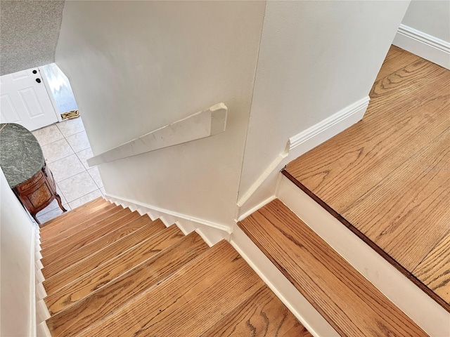 508 Sandtree, Palm Beach Gardens, FL 33403 - stairs featuring baseboards