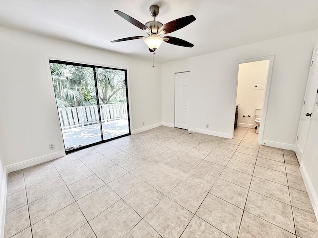 508 Sandtree, Palm Beach Gardens, FL 33403 - empty room with a ceiling fan and light tile patterned flooring