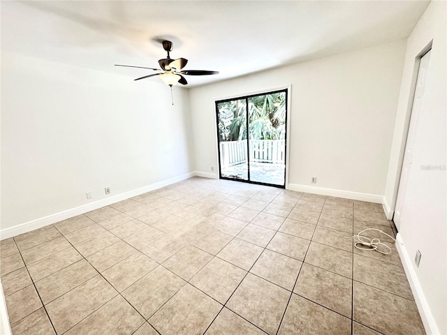 508 Sandtree, Palm Beach Gardens, FL 33403 - spare room featuring light tile patterned floors and ceiling fan