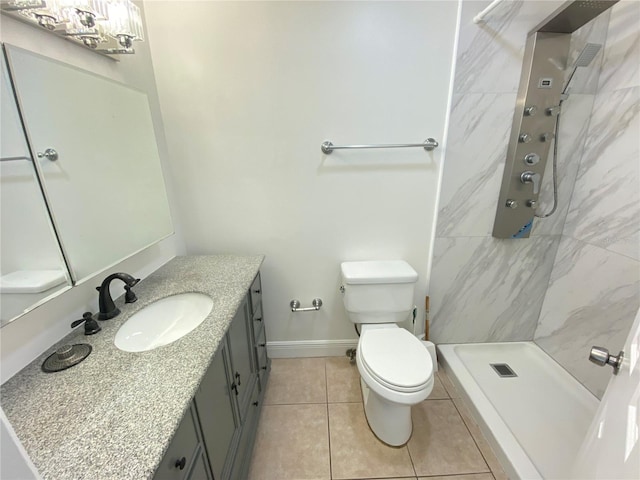 508 Sandtree, Palm Beach Gardens, FL 33403 - full bathroom featuring tile patterned floors, vanity, and a shower stall