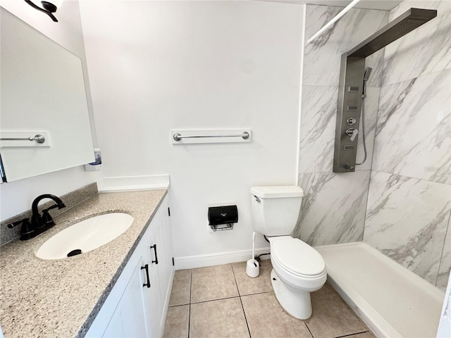 508 Sandtree, Palm Beach Gardens, FL 33403 - bathroom with vanity, a marble finish shower, and tile patterned flooring