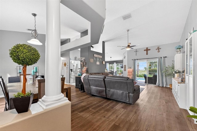 544 Lake Sumner Dr, Groveland, FL 34736 - living area featuring ornate columns, a ceiling fan, wood finished floors, and high vaulted ceiling