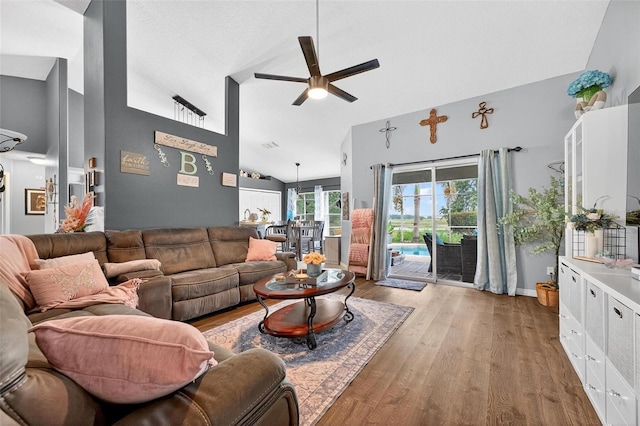 544 Lake Sumner Dr, Groveland, FL 34736 - living area featuring a ceiling fan, wood finished floors, and high vaulted ceiling