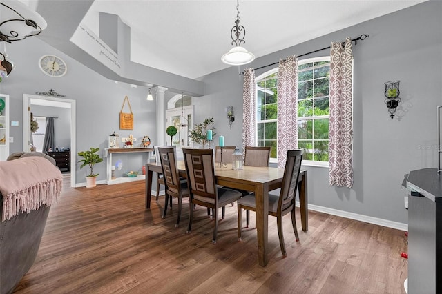 544 Lake Sumner Dr, Groveland, FL 34736 - dining room with wood finished floors and decorative columns