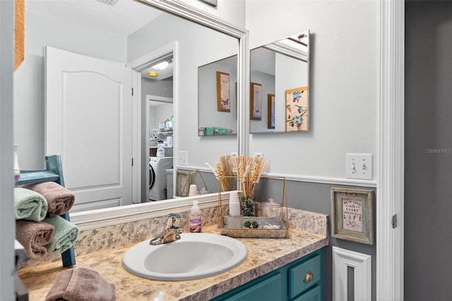 544 Lake Sumner Dr, Groveland, FL 34736 - bathroom featuring washer / dryer and vanity