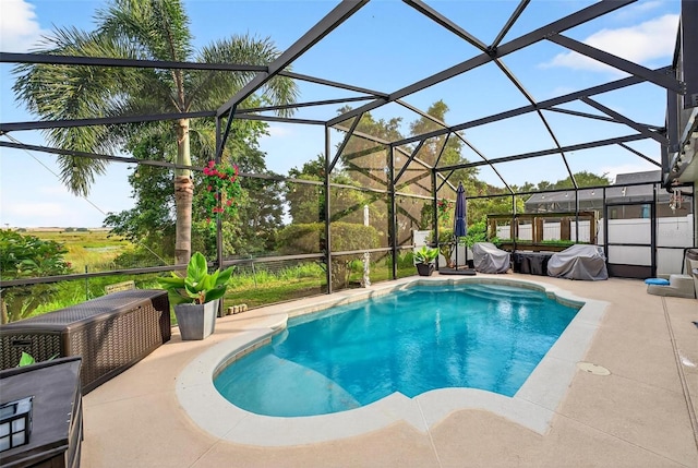 544 Lake Sumner Dr, Groveland, FL 34736 - view of swimming pool featuring a patio area and glass enclosure