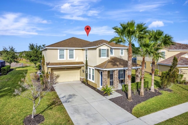 4123 Oaktree Dr, Davenport, FL 33837 - view of front facade with stucco siding, stone siding, driveway, a garage, and a front yard