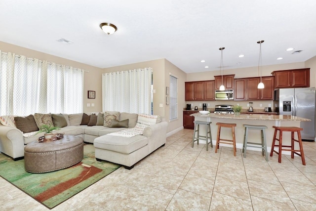 4123 Oaktree Dr, Davenport, FL 33837 - living area featuring recessed lighting and baseboards