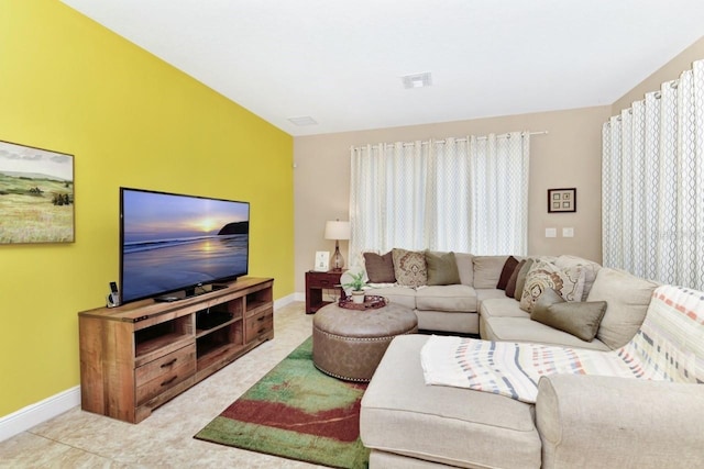4123 Oaktree Dr, Davenport, FL 33837 - tiled living area featuring baseboards