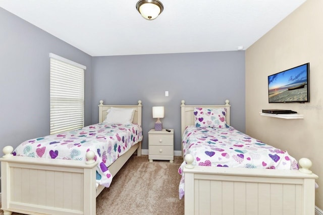 4123 Oaktree Dr, Davenport, FL 33837 - bedroom with carpet floors and baseboards