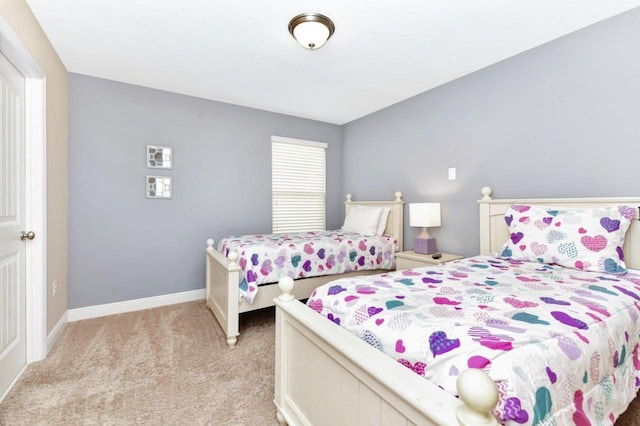 4123 Oaktree Dr, Davenport, FL 33837 - bedroom featuring light colored carpet and baseboards