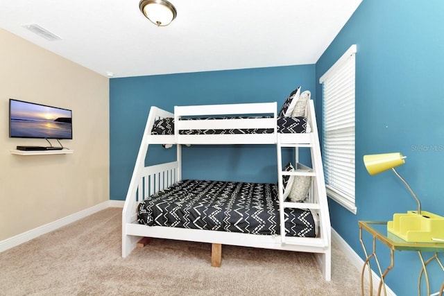 4123 Oaktree Dr, Davenport, FL 33837 - carpeted bedroom featuring baseboards