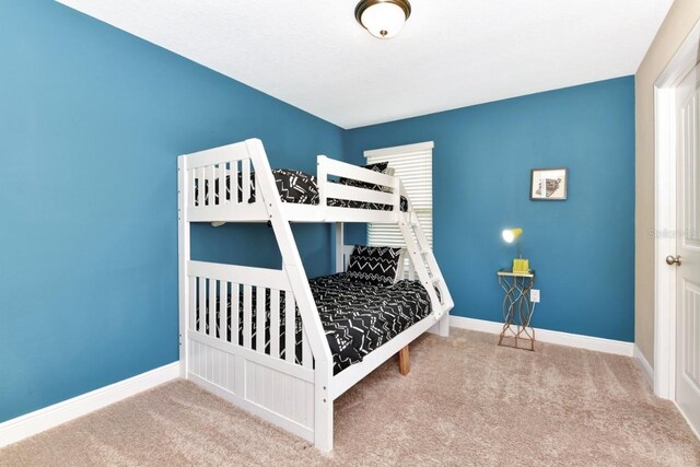 4123 Oaktree Dr, Davenport, FL 33837 - carpeted bedroom with multiple windows