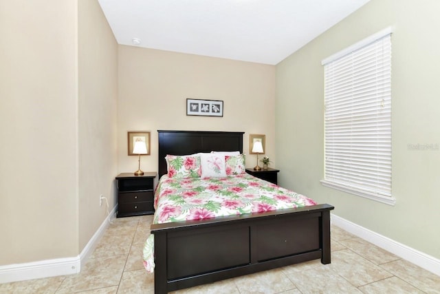 4123 Oaktree Dr, Davenport, FL 33837 - bedroom featuring light tile patterned floors and multiple windows