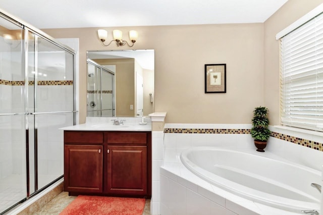 4123 Oaktree Dr, Davenport, FL 33837 - bathroom featuring a garden tub, a stall shower, vanity, and tile patterned floors