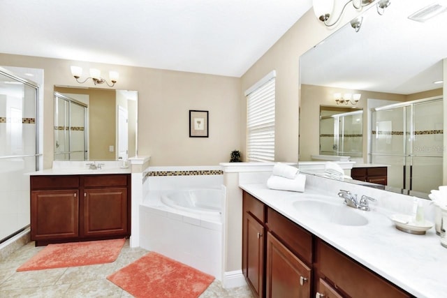 4123 Oaktree Dr, Davenport, FL 33837 - full bathroom with a shower stall, two vanities, a bath, and a chandelier