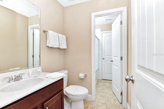 4123 Oaktree Dr, Davenport, FL 33837 - bathroom featuring vanity, tile patterned flooring, and bath / shower combo with glass door