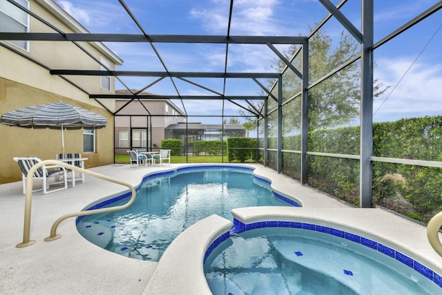 4123 Oaktree Dr, Davenport, FL 33837 - view of swimming pool with a pool with connected hot tub, a patio area, and glass enclosure