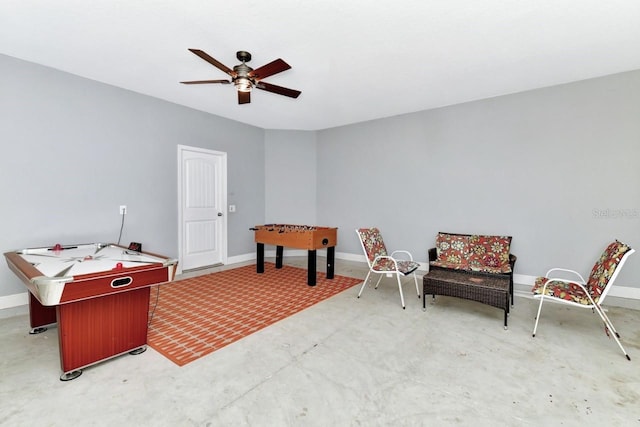 4123 Oaktree Dr, Davenport, FL 33837 - playroom with a ceiling fan and concrete flooring