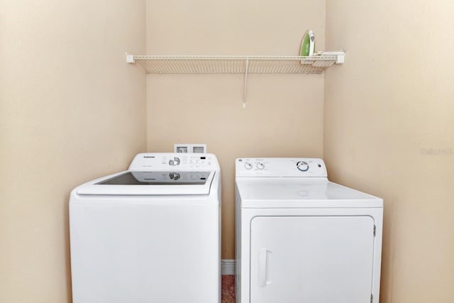 4123 Oaktree Dr, Davenport, FL 33837 - washroom with independent washer and dryer